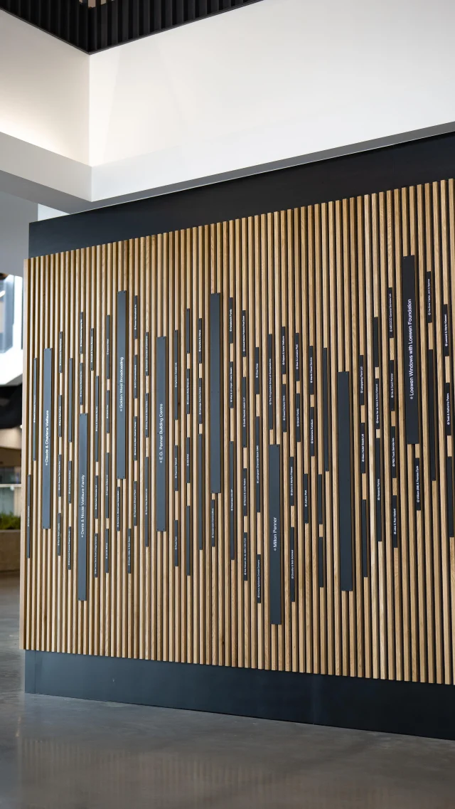 If you caught our last post, you saw the vision behind the donor wall at the southeasteventcentre. 

Now here’s a look at some of the hands-on work we put in and how it came together.

After getting our concept sketches and 3D renders through the approvals stage, came time to further refine our design and produce shop drawings for manufacturing and installation.

Creating a unique display that also fit in with the surrounding environment meant carefully sourcing materials and finishes to strike the balance we were aiming for.

The laser-etched and powder-coated aluminum donor nameplates are affixed to the slatted white oak backdrop with counter-sunk fasteners.

Select details like dimensional lettering and cast bas-relief portraits create an added layer depth to enhance the backstory plaque.

#letsbuildyourbrand #southeasteventcentre #steinbachmanitoba #interiorsignage #signagemaker #signagesolutions #onpoint